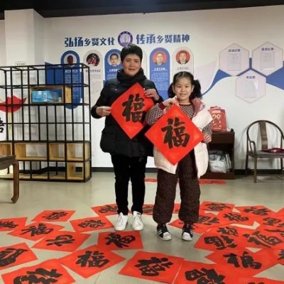 海昌街道隆兴社区学校组织写春联、送祝福、迎新年活动